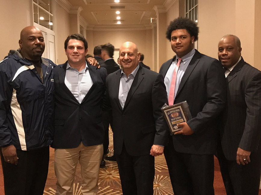 Huntington football coaches and All-County players Sam Bergman and Clay Jamison.