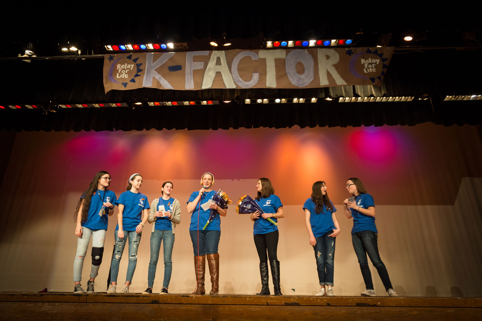 Kelly Krycinski at the microphone at  last March's K-Factor talent show.