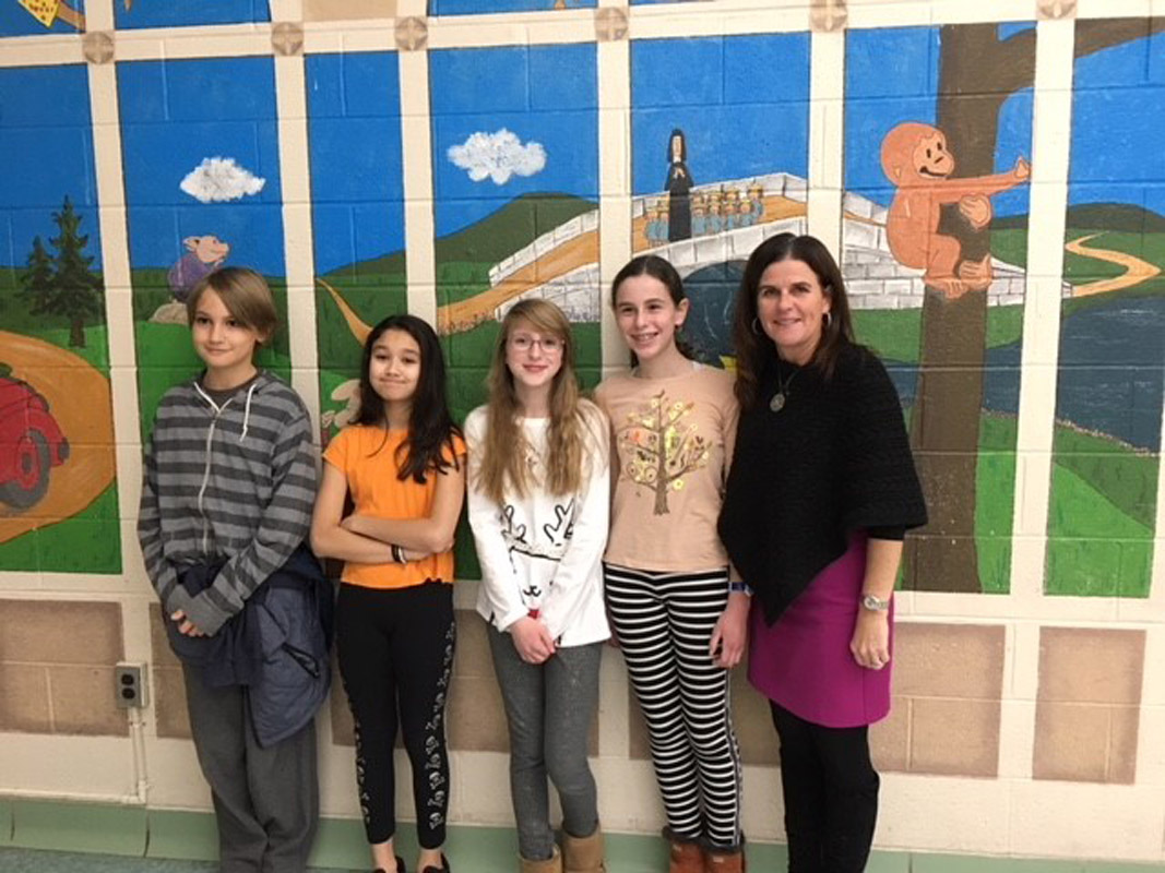 Woodhull School Principal Traci Roethel with PTA Reflections contest award recipients.