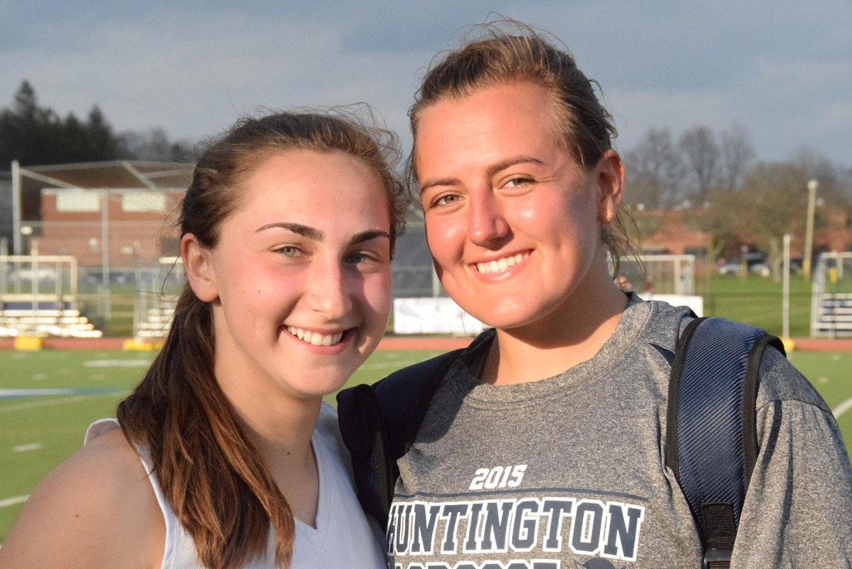 Katie Reilly and Emma DeGennaro as Huntington juniors in April 2015.