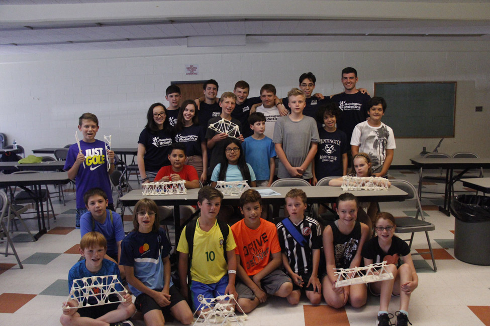 Robotics team members worked closely with the STEM Academy participants