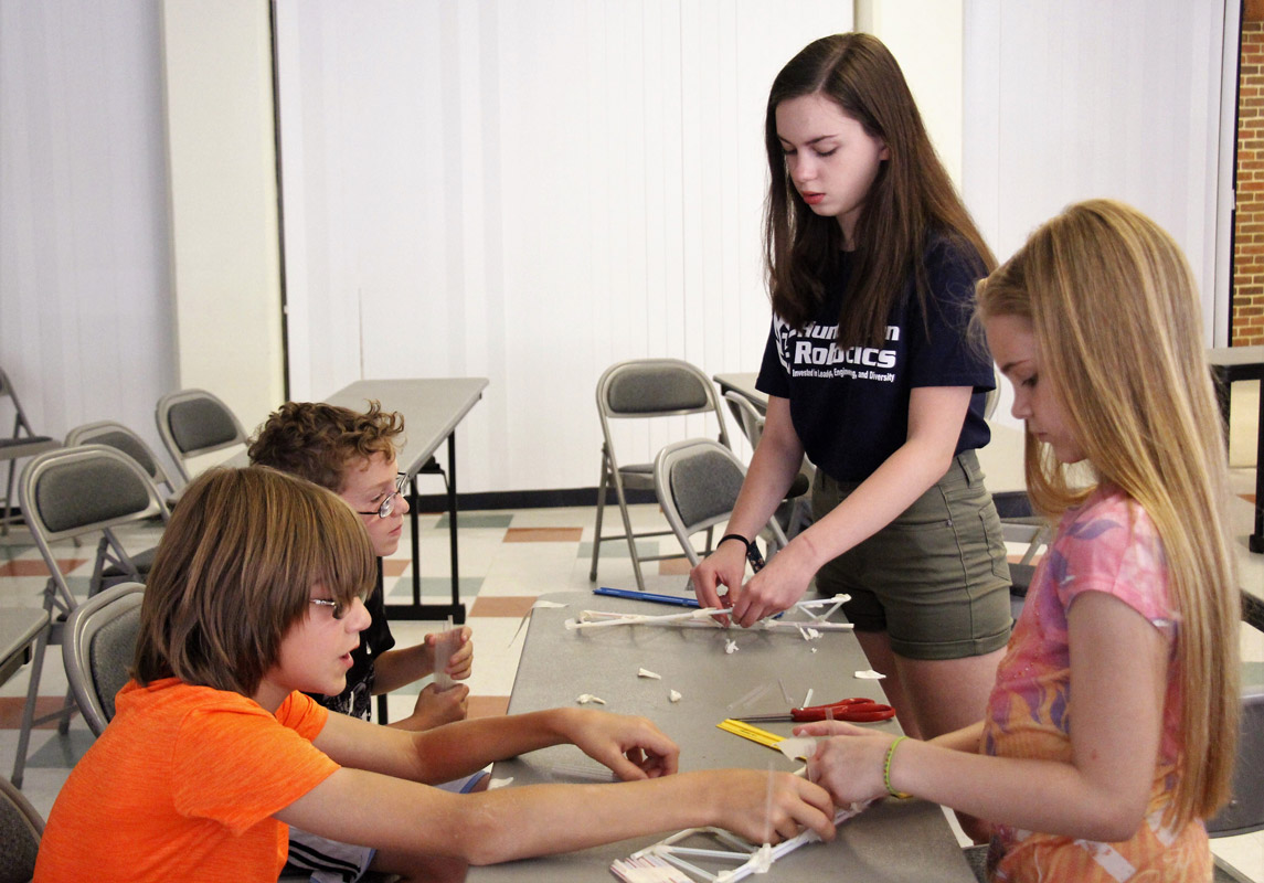 Robotics team members worked closely with the STEM Academy participants