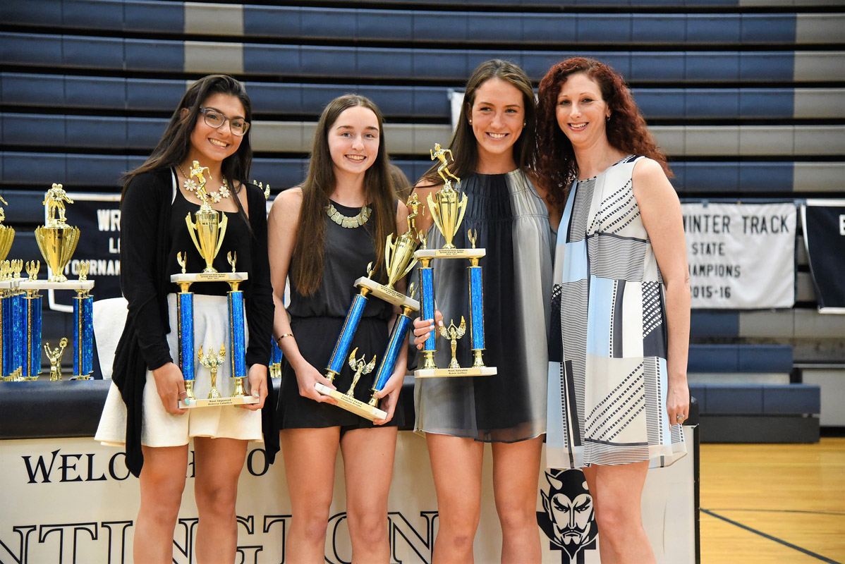 Rebecca Caballero (left) with winter track teammates