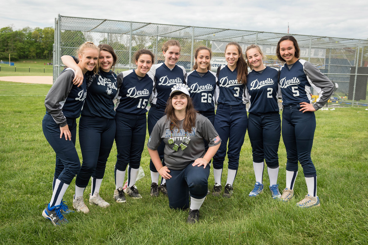 Sarah Grassi surrounded by her teammates