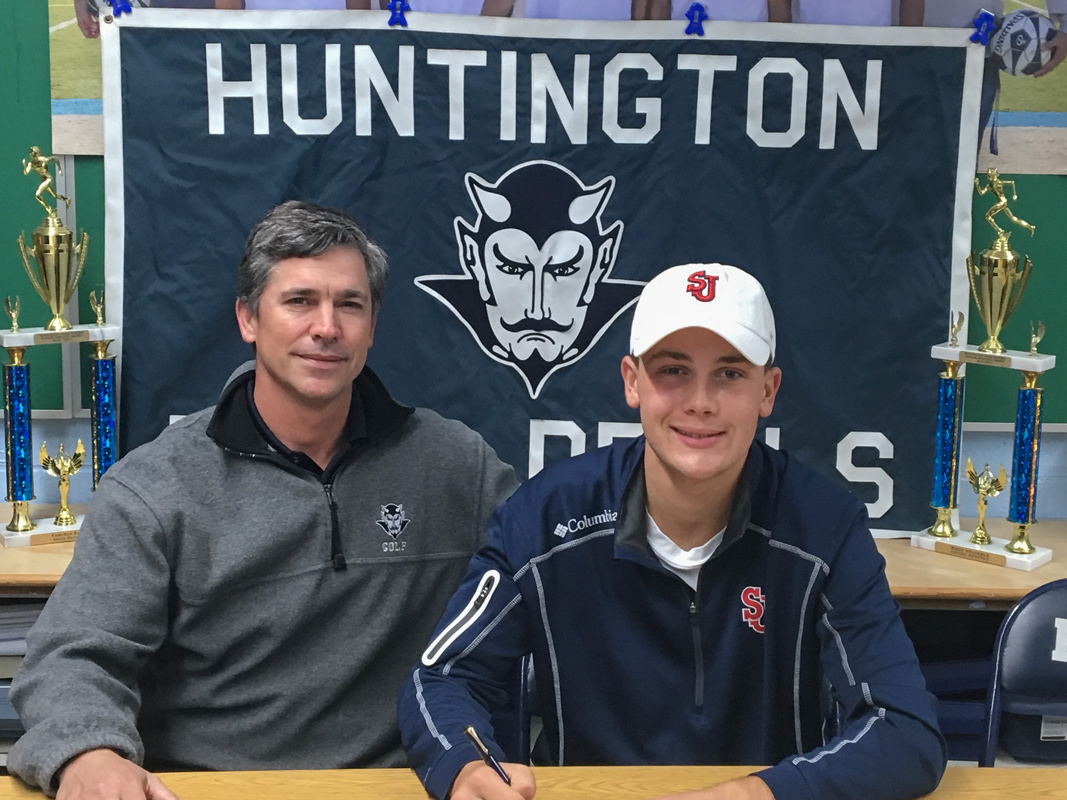 Tyler Gerbavsits with Huntington golf coach Mike Marinello. 