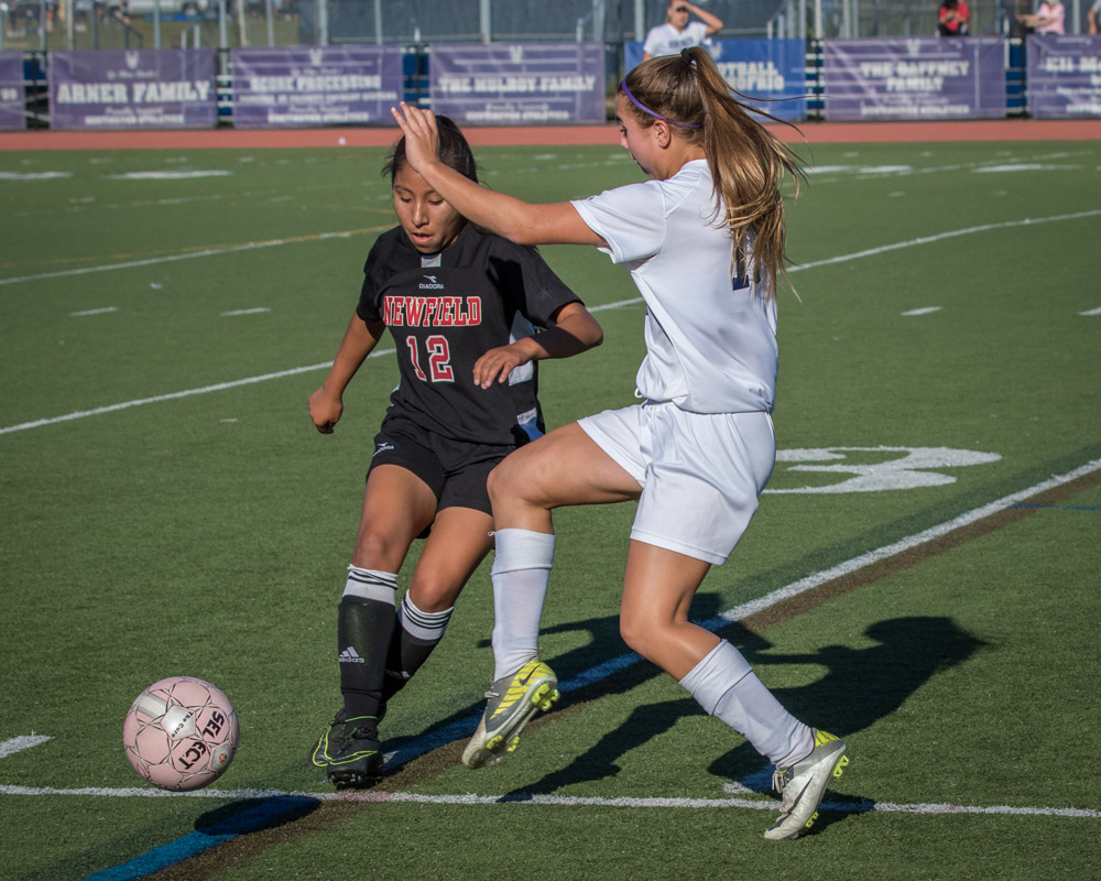 Sophomore Marissa Stafford uses fancy footwork to evade the defense. 