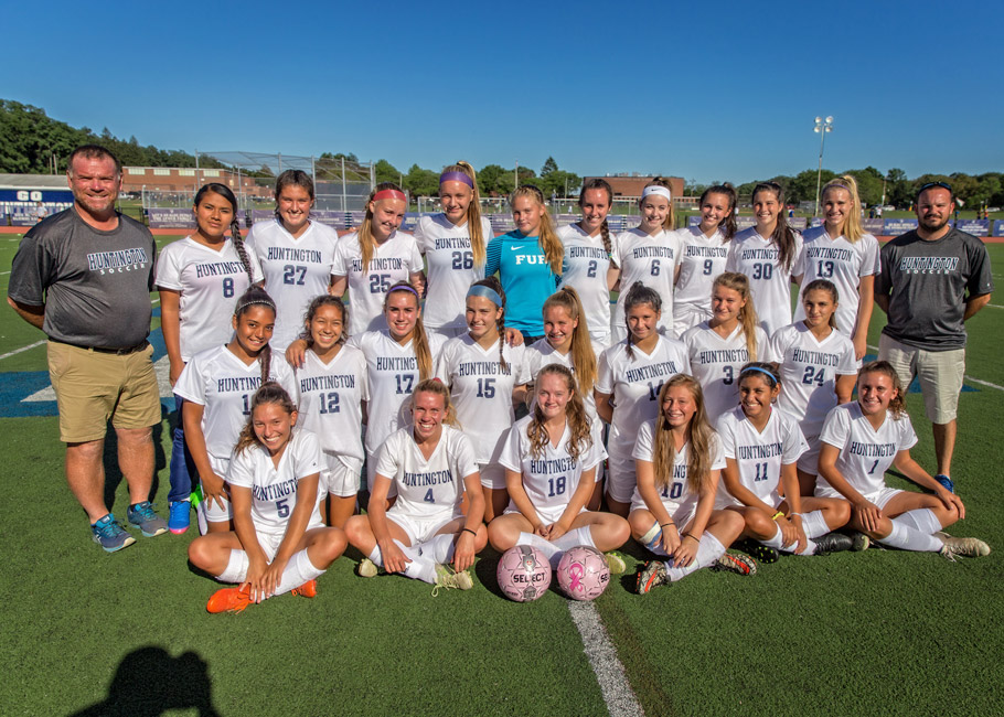 Girls' soccer team huddles up