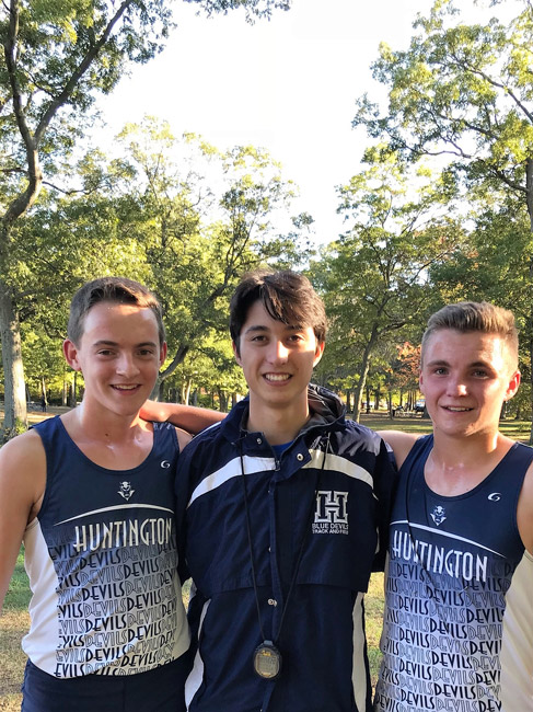 sophomore Jason Verville, Captain Ryan Smith and junior Graham Young