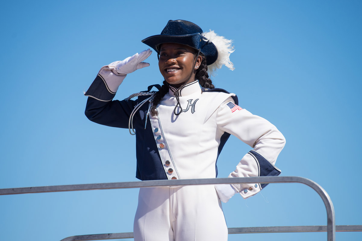 marching band drum major Mardnie Mentor salutes