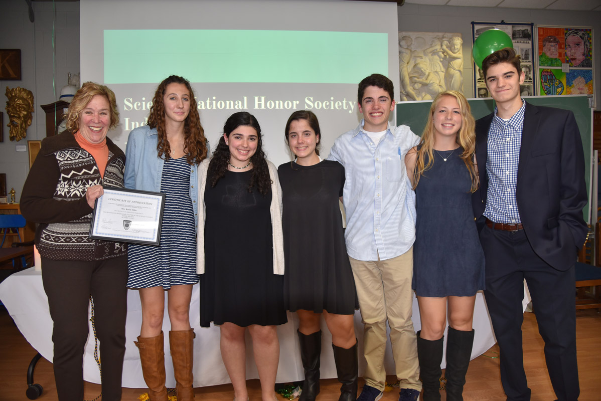 Science Honor Society officers with Karen Miller (left) of the Huntington Breast Cancer Action Coalition 