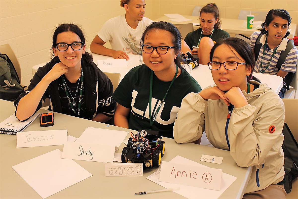Jessica Pulizzotto (left) with her teammates at the LIU Post summer robotics program.