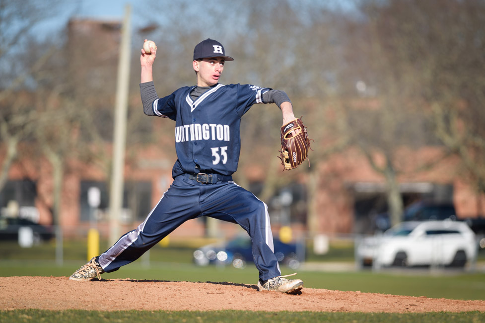 Huntington freshman Chris Segreti fires the pitch to the plate. (Darin Reed photo.)
