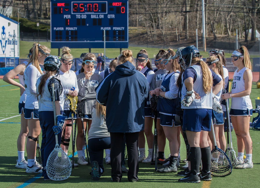 The Blue Devils huddle. (Mike Connell photo 