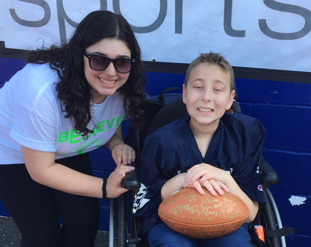 Rachel Moss with the unforgetable Eli Mollineaux at Blue Devil Field.