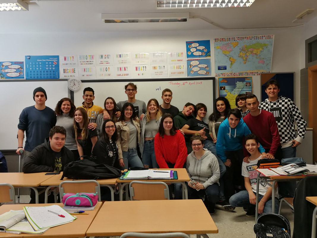 Teacher Isabel Perez in Spain with a group of her students.