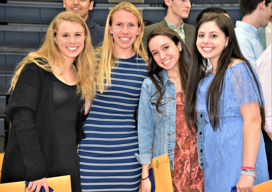 Serina Aguirre (second from right) at last week's Distinguished Seniors dinner.