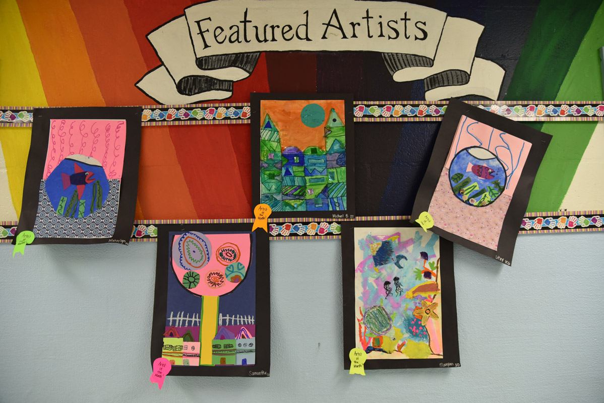 Washington School's Featured Artistis for April are displaying their work in the main hallway.