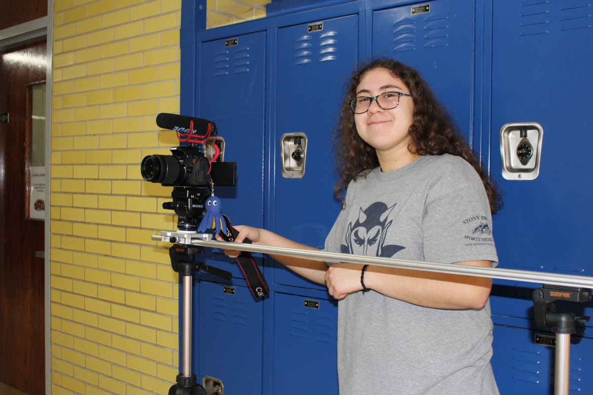Huntington sophomore Caitlyn Palermo handles camera duties for the film The Hunt.	