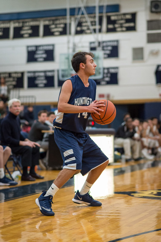 Senior Gerard Federici has the ball for Huntington. (Darin Reed photo.)