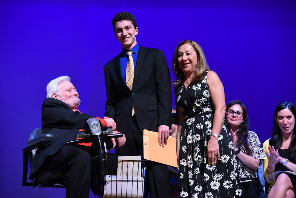 Edna Van Wart Award recipient Aidan Forbes with 1958 alum Thomas Chieffo and Math Chair Kathleen Aufiero 