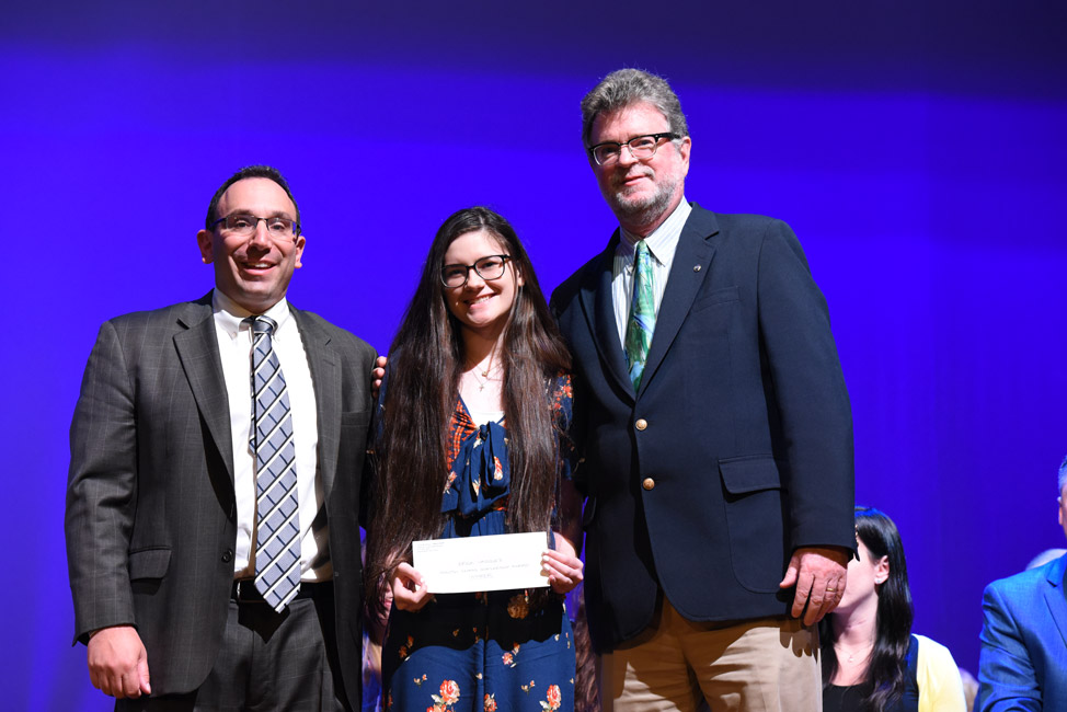 Quentin Sammis Award recipient Erica Vazquez with Matt Minero and John Reilly of Kiwanis. 