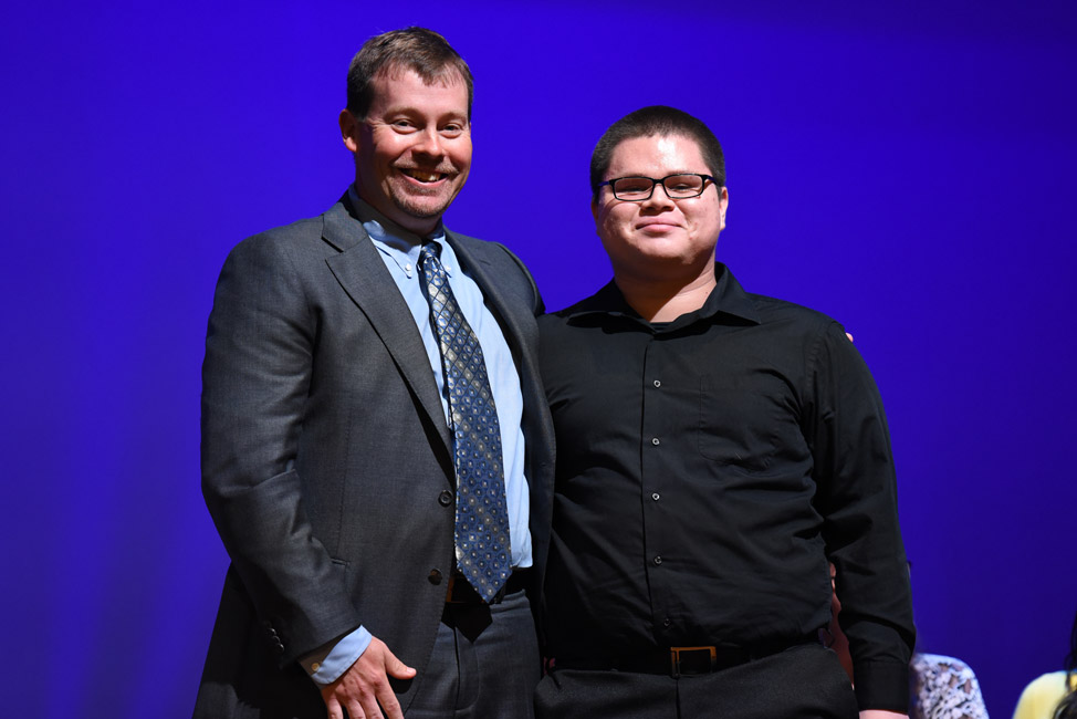ATH President James Graber with Joan Balari Memorial Scholarship Award recipient Joel Alfaro