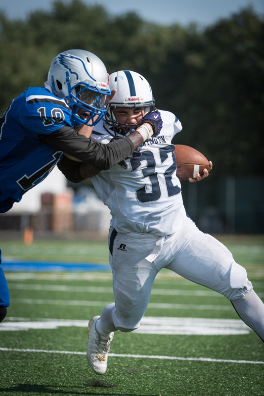 Huntington senior Sebastian Abreu refused to be brought down. (Darin Reed photo.)