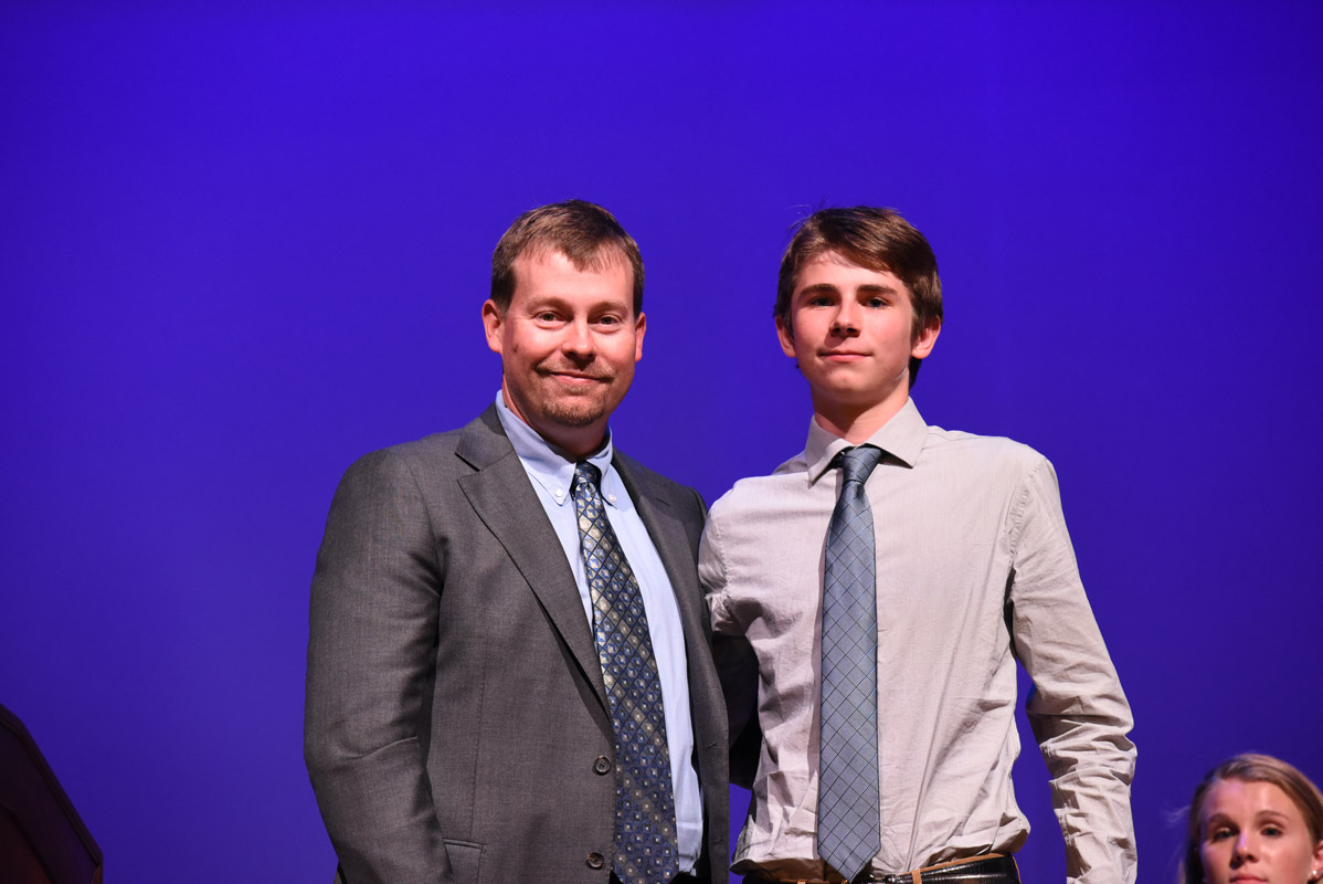 ATH President James Graber presented Lars Drace with the organization's Alan Kuver Scholarship Award