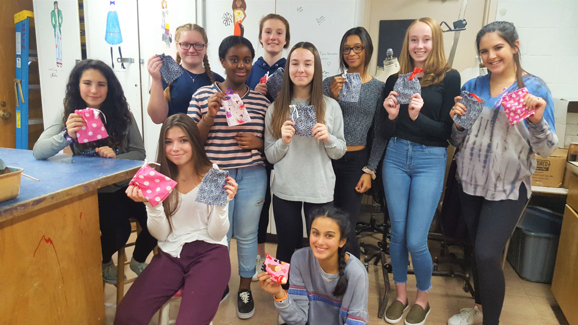 These first year fashion students at Huntington High School created doll dresses for charity to make the holiday brighter for children.