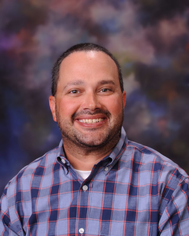 Huntington teacher Brian Stellato will coordinate the summer music and art enrichment program.