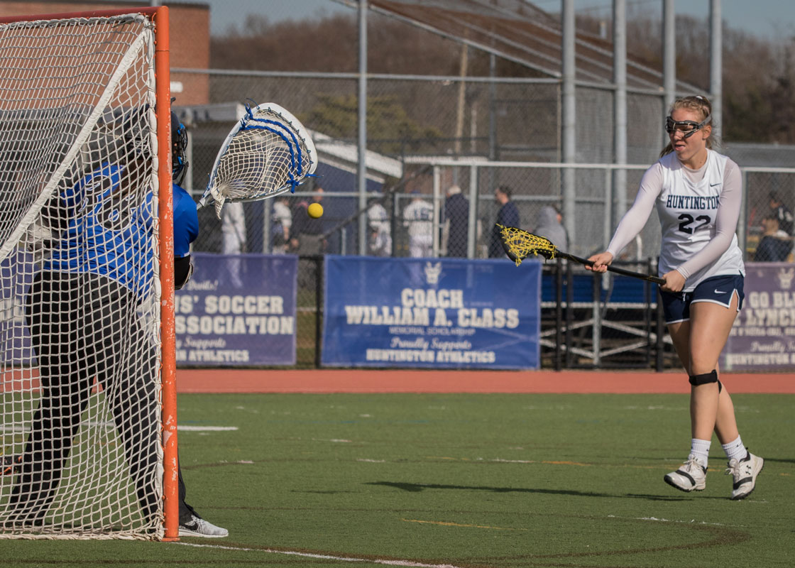 Charlotte Maggio puts the ball past the goalie. (Mike Connell photo.)