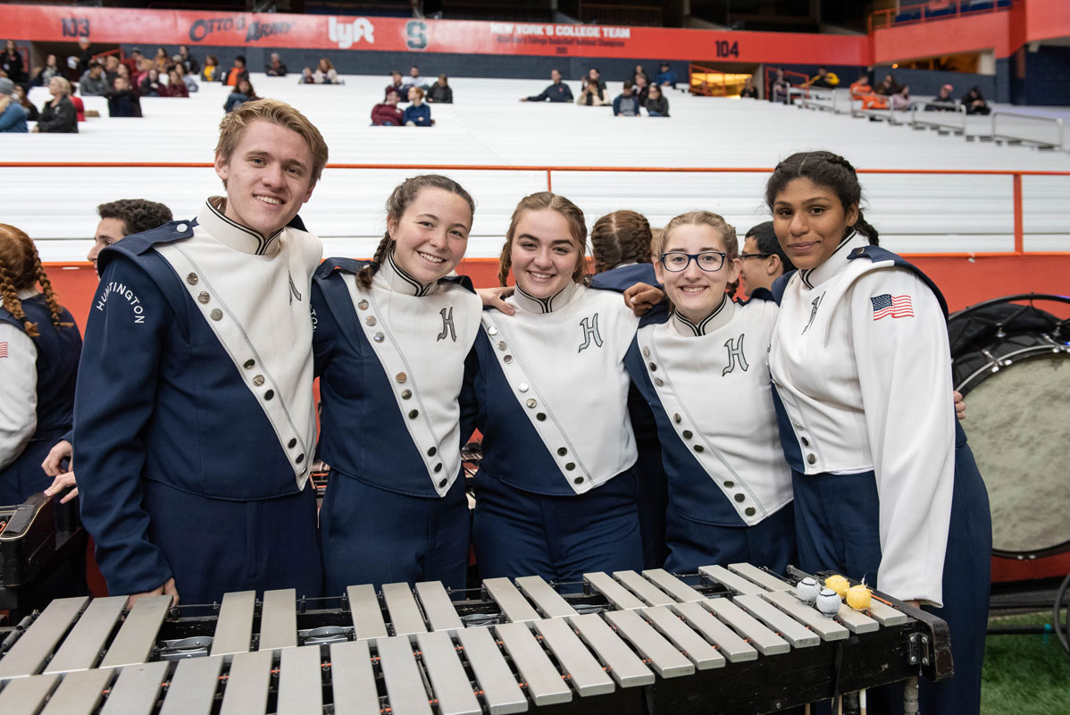 Chris Mavrogian (left) with fellow Blue Devil marching band members at the state championships. (Darin Reed photo.)