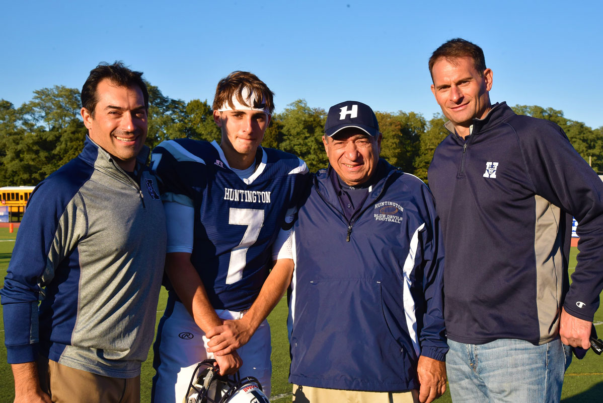 JP Paci with his family, who have all played key roles in the Huntington football program.
