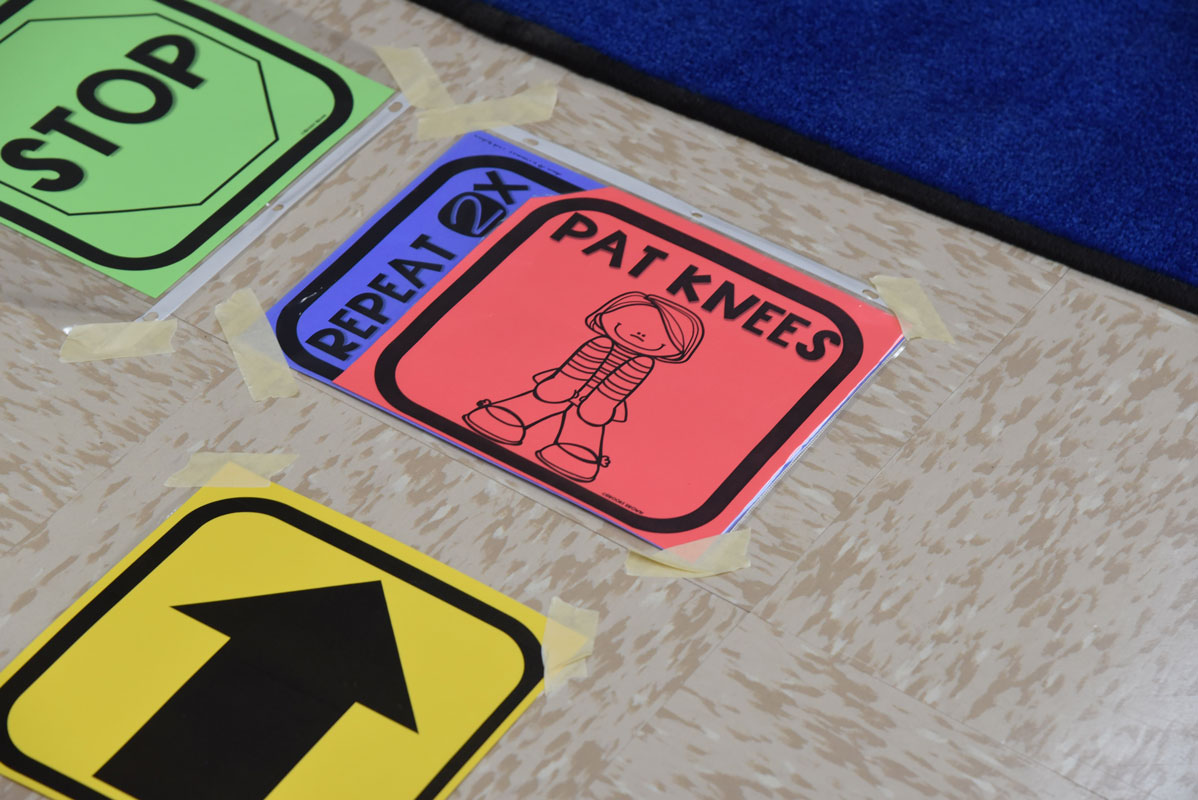 Washington students made their way around a hopscotch coding maze (1)