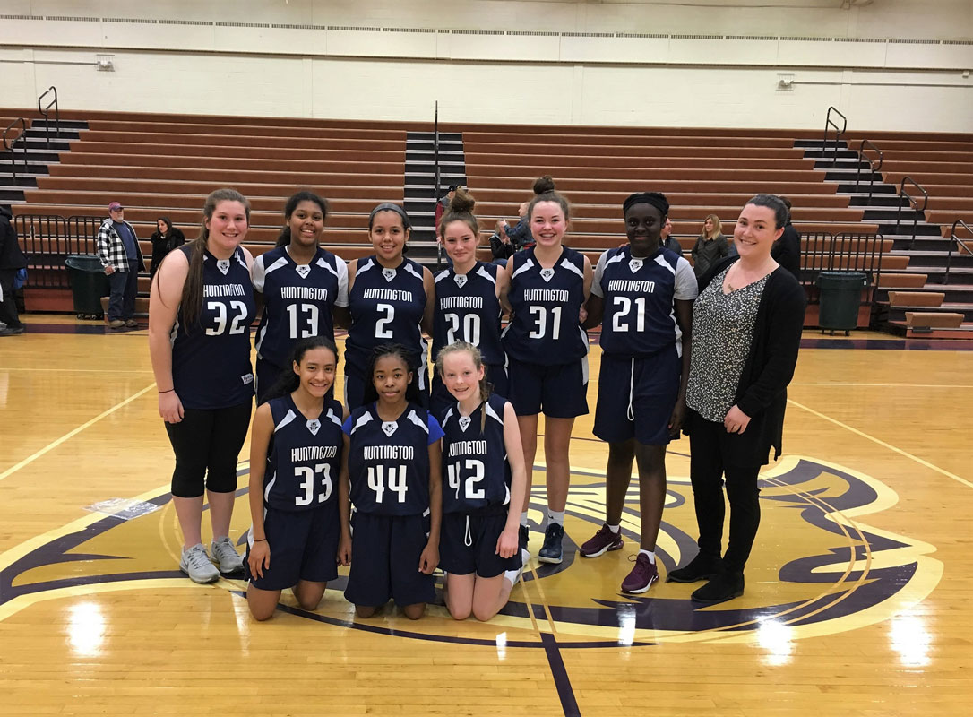 Huntington's JV girls' basketball team won the Islip tournament championship.