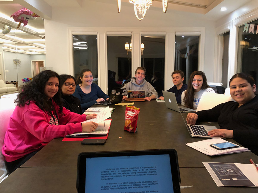 Huntington mock trial team members preparing for battle this past Tuesday.