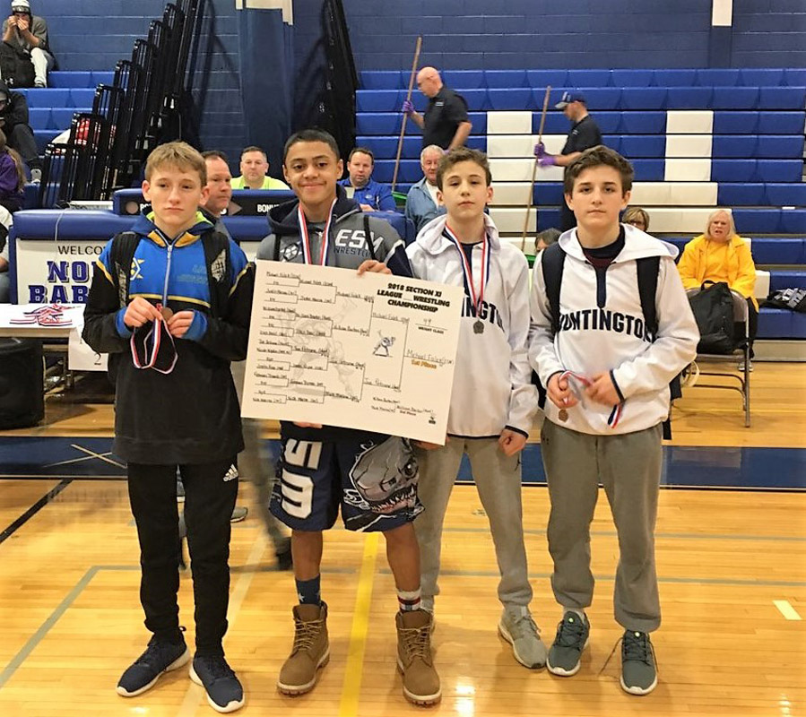 Huntington's Joe Petrone and Billy Burton placed in the top four at 99 lbs. in the Suffolk League IV tournament.