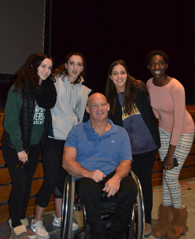 Pete Hawkins with a group of Huntington High School students.