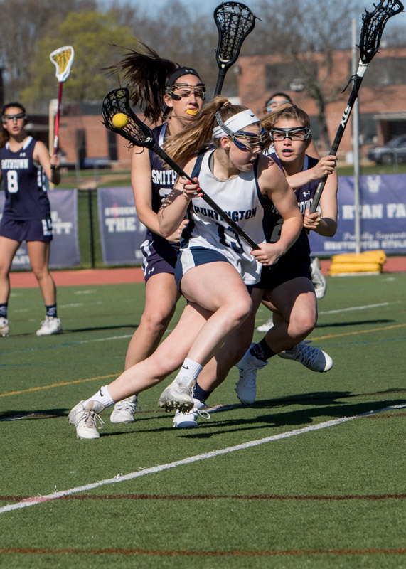 Huntington senior Emma Greenhill dodges the defense last spring. (Mike Connell photo.) 