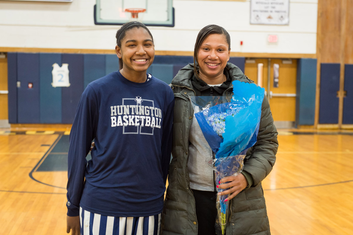 Huntington senior Nicole Leslie on Senior Day with her mom, April. (Darin Reed photo.)