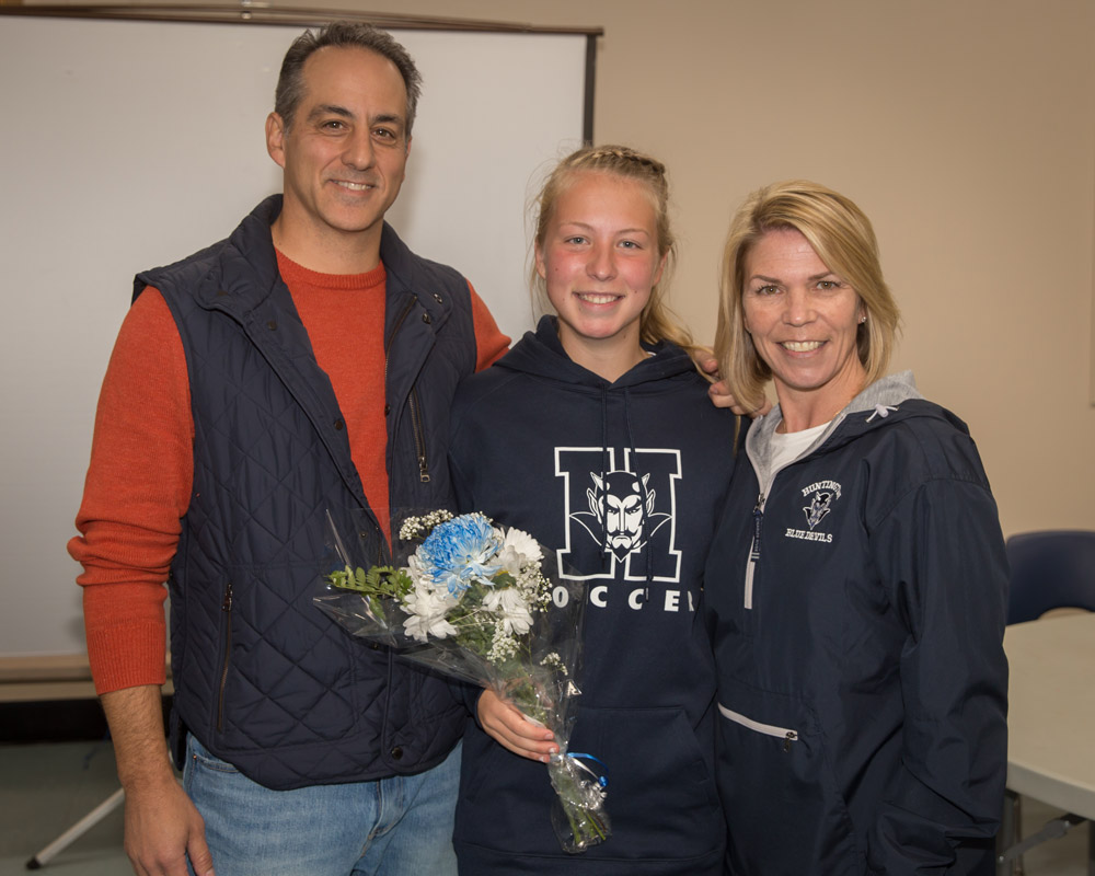Alexandra Lourenso with her parents, Frank and Kathy on girls' soccer Senior Day. (Mike Connell photo.)
