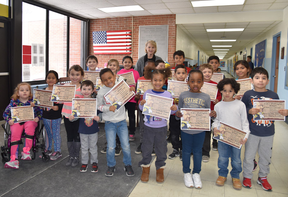 Principal Marsha Neville with December's Washington Ways Award recipients.