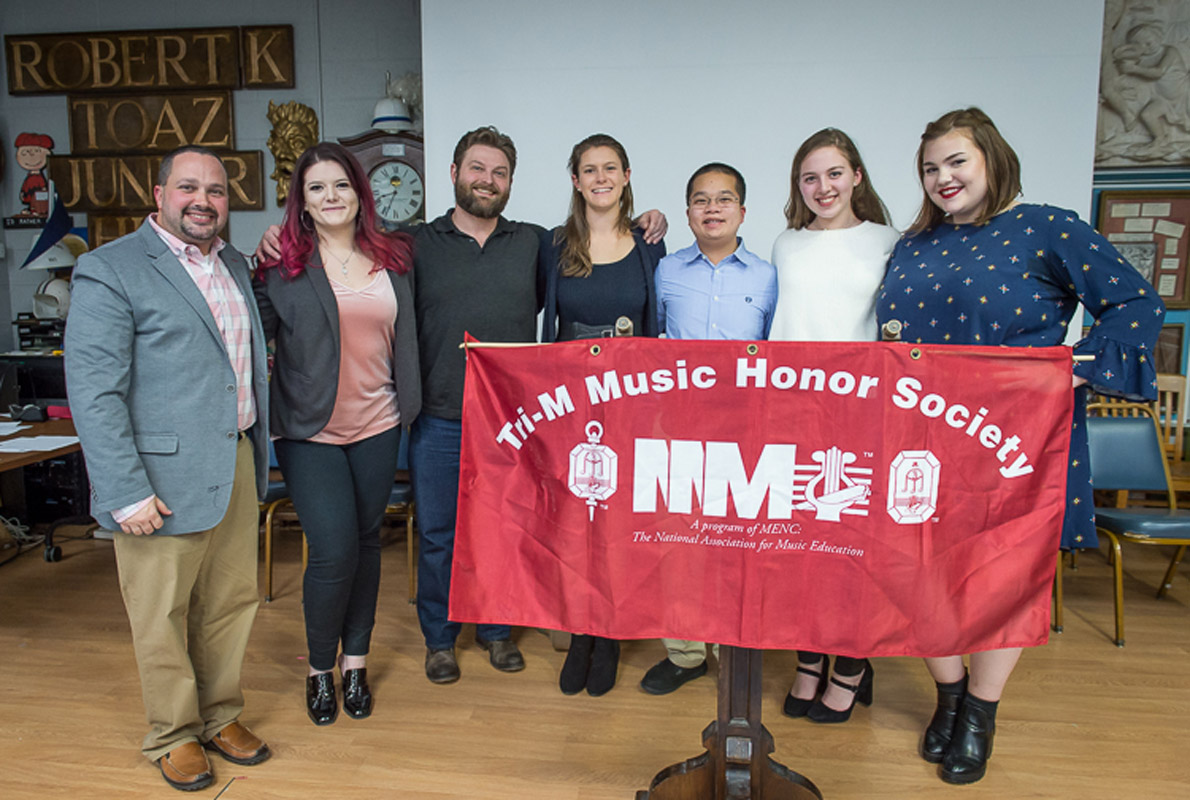Tri-M officers and faculty advisors with Broadway star Brandon J. Ellis. (Darin Reed photo.)