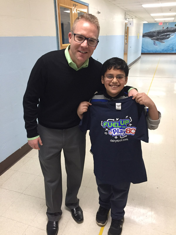 Southdown Principal Scott Oshrin with cup stacking champion Jaipreet Singh.