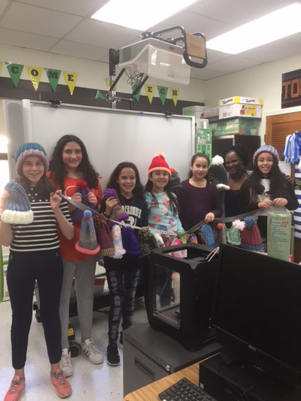 The Woodhull students with building aide Peggy DeLaRosa.
