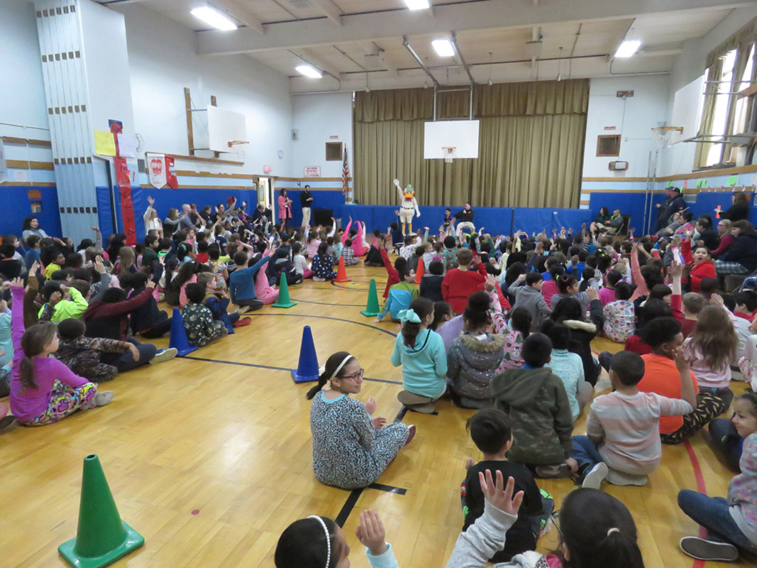 The Flower Hill gym was packed at QuakerJack stepped up the plate.