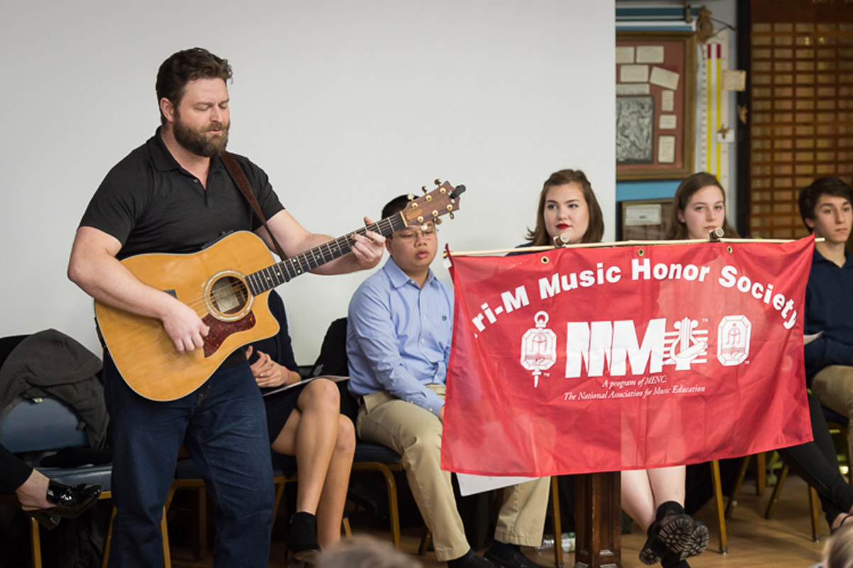 Broadway and television actor and musician Brandon J. Ellis spoke at the Huntington Tri-M induction.