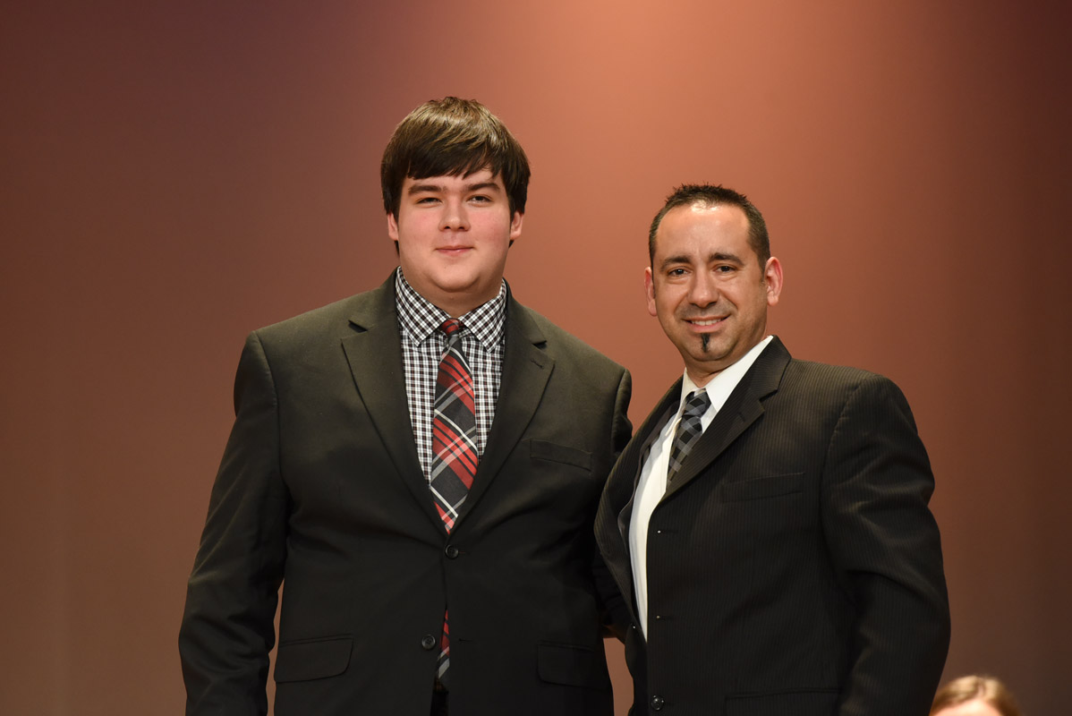 Jacob LaBarge with Huntington music teacher Jason Giachetti last June.