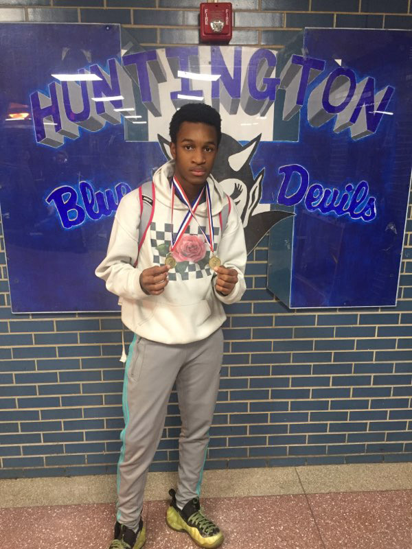 Anthony Joseph shows off his gold medals.