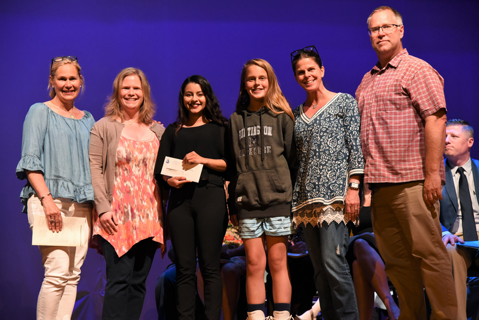 Roccio Rivas Lizama (third from left) at the scholarship presentation with members of Kate Bender's family 